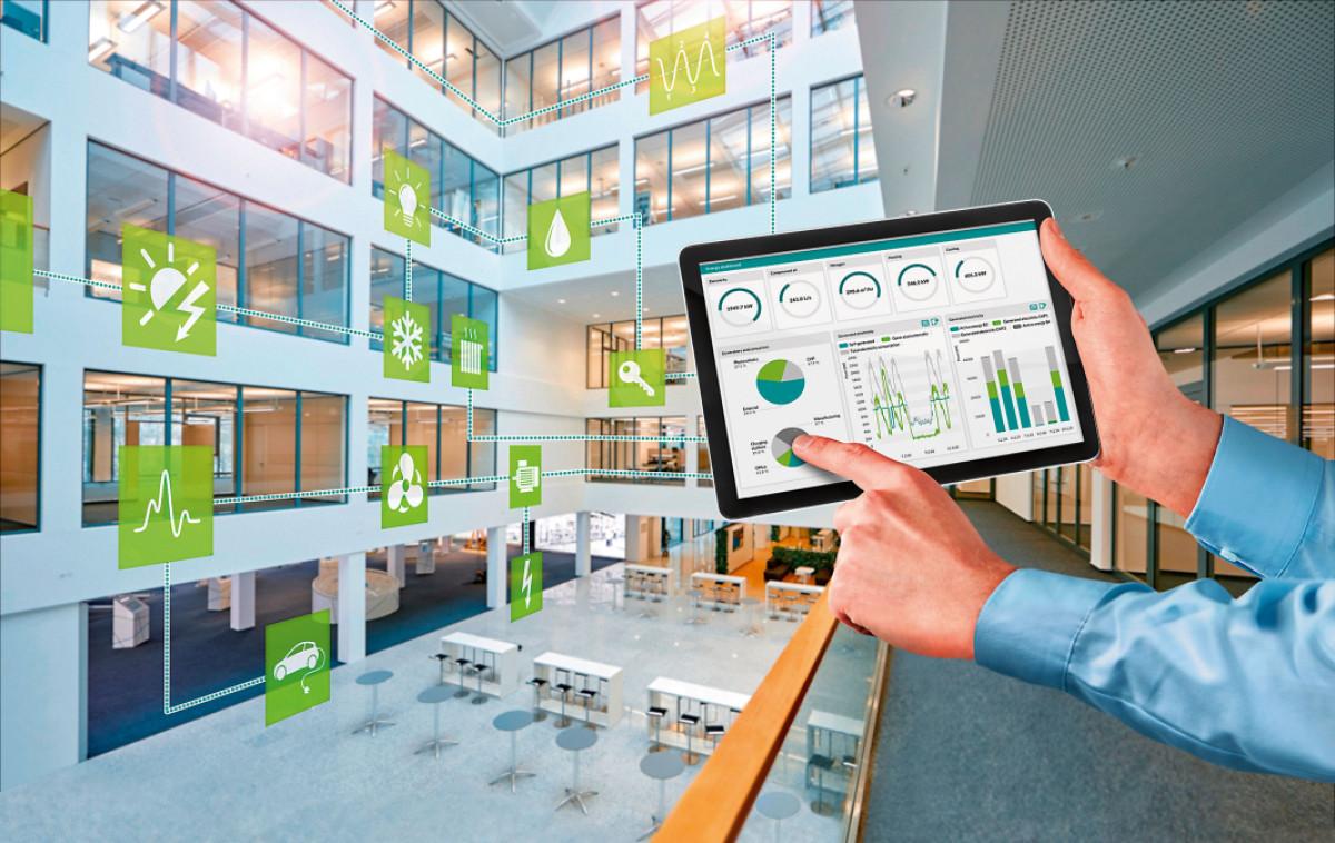 BOFS engineer reviewing data on a tablet at an industrial site